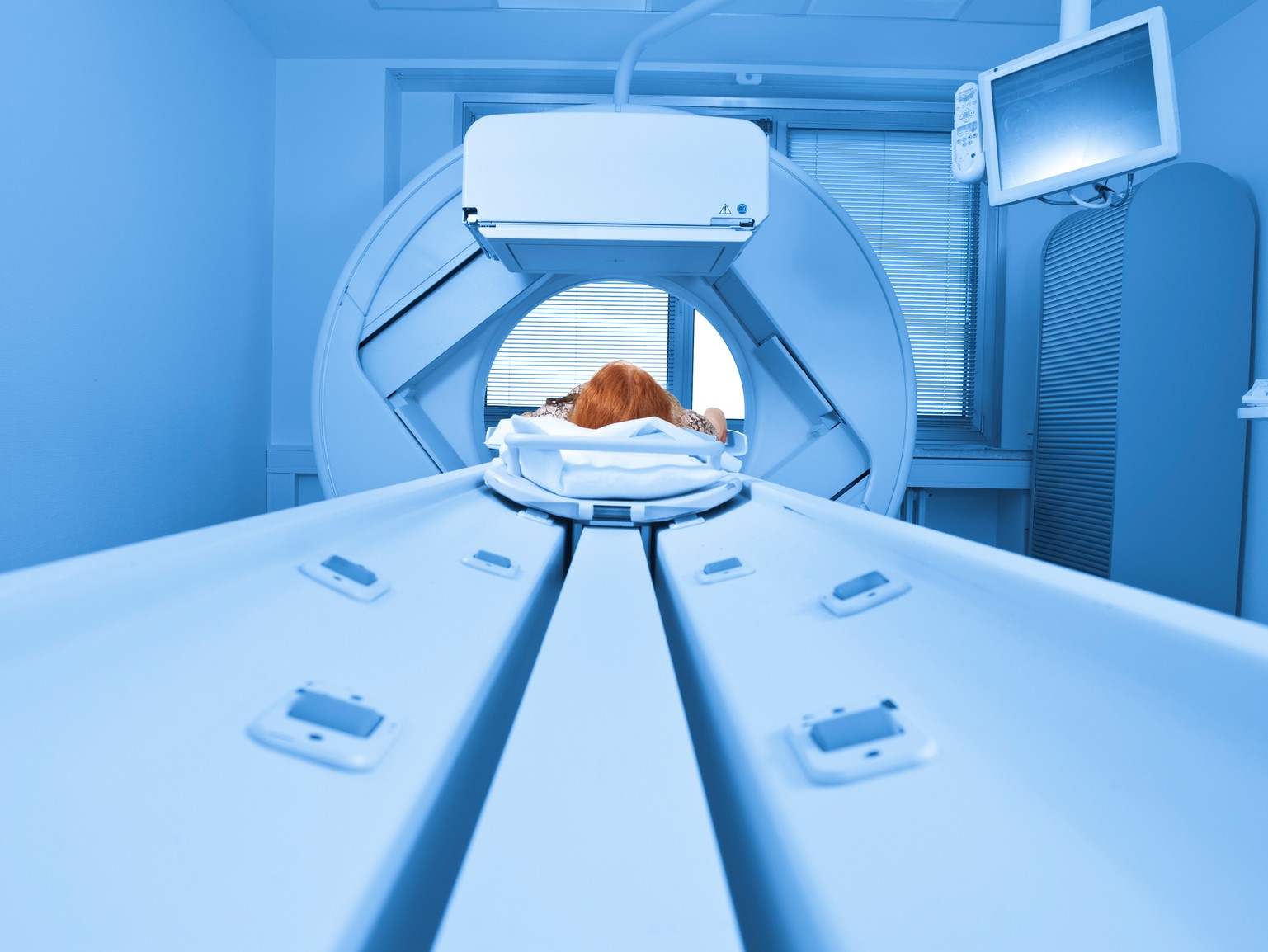 stock-healthcare-person in MRI machine
